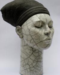 Female raku fired head, height 48 cm