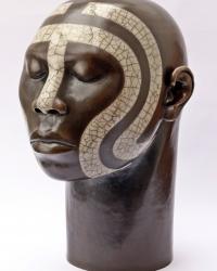 Male ceramic head with tribal design