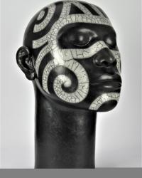 Male ceramic head with tribal design