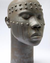 Large ceramic head inspired by African body scarification