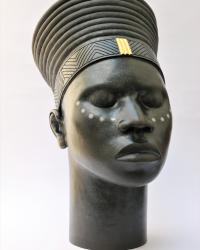 Raku fired female ceramic African head, with gold leaf detail