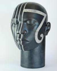 Raku fired ceramic head with tribal design, height 43cm