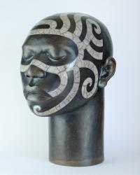Raku fired ceramic head with tribal design, height 46cm