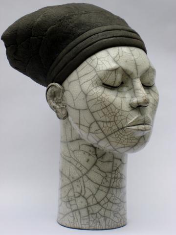 Female raku fired head, height 48 cm