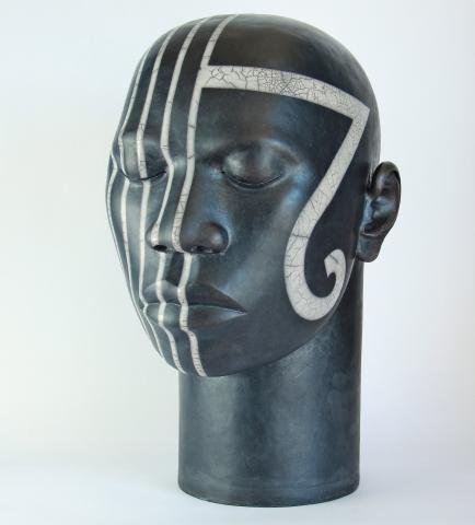 Raku fired ceramic head with tribal design, height 43cm